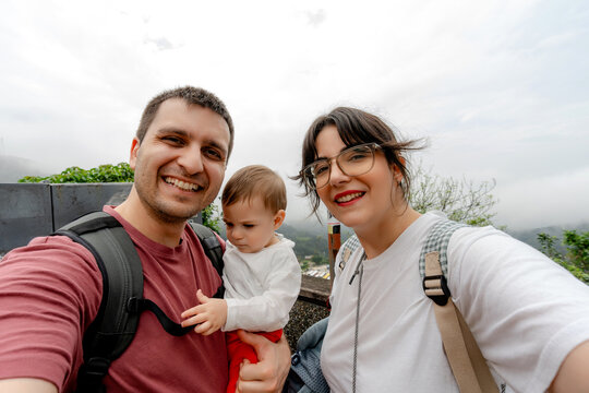 Family selfie in Jiufen, Taiwan street setting