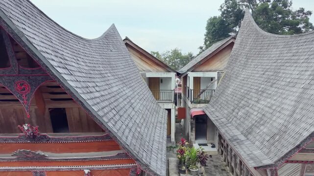 Traditional Houses With Intricate Carvings. Serene Village Featuring Wooden Homes of batak tribes