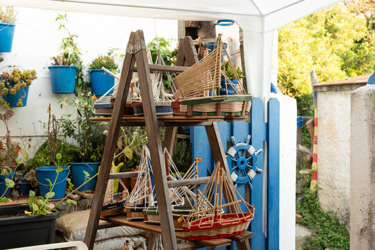 Handcrafted model fishing boats at Palamos seaside stall