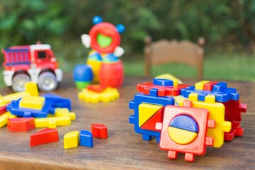 Colorful Outdoor Toy Blocks and Vehicles for Kids. © Rum