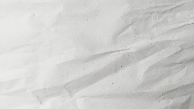 Blank white recycled paper background with soft wrinkled fold texture. White paper sheet surface texture background. Clean empty white paper abstract surface.
