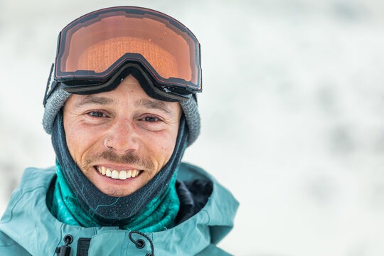 Joyful skier in winter gear enjoying Pyrenees snow