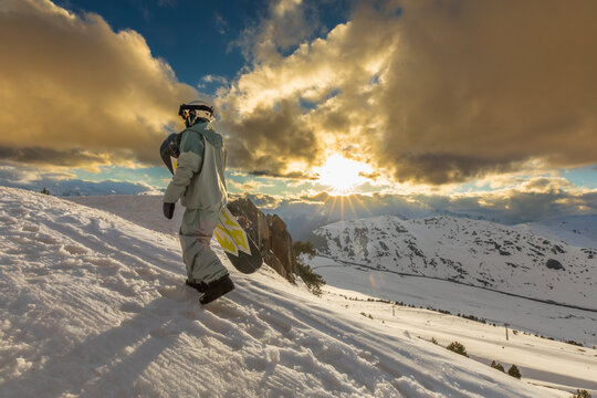 Snowboarder navigating snowy slope in the Pyrenees