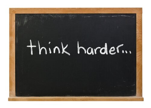 Think harder AI prompt written in white chalk on a black chalkboard isolated on white
