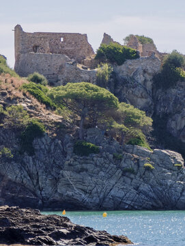 Castell de la trinitat ruins overlooking mediterranean sea coast