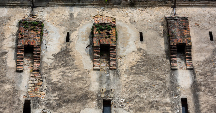 Medieval brick garderobe ruin on historic wall in Sighisoara, Transylvania, Romania.