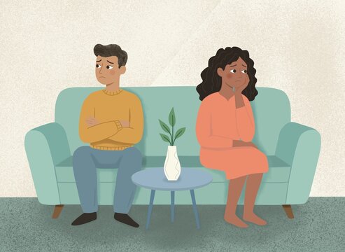 Distressed couple on sofa facing relationship communication issue