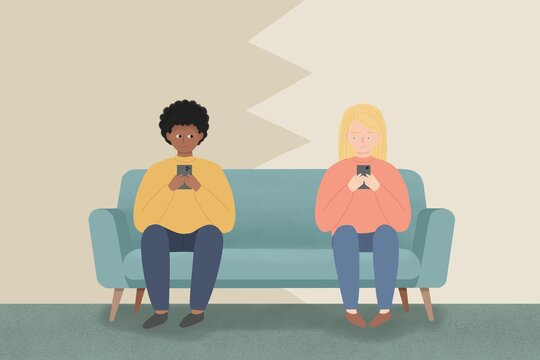 Couple ignoring each other on sofa with smartphone stress
