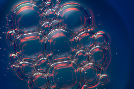 Holographic serum bubbles reflecting light beautifully