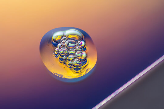 Holographic texture of a cosmetic serum drop