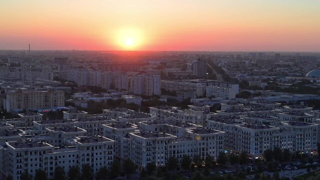 Tashkent, Uzbekistan - July 05, 2026: Tashkent City at Golden Hour, Modern Skyline Glowing in Warm Evening Light. Uzbekistan. 4K