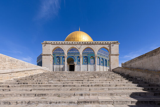 Golden Dome of the Rock with blue mosaic tile in Jerusalem