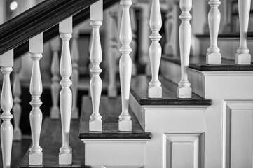 Fototapeta premium New England Architecture of a Formal Wooden Stairway with Bannisters and Balustrades.