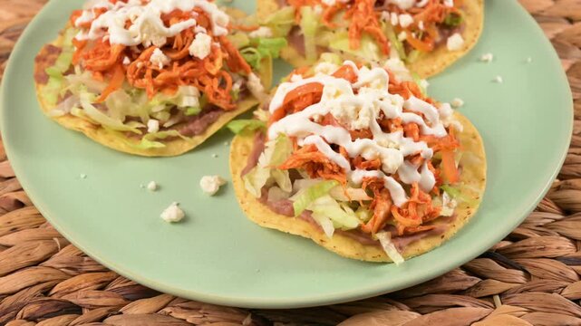 Close-up of homemade tostadas de tinga served on a plate