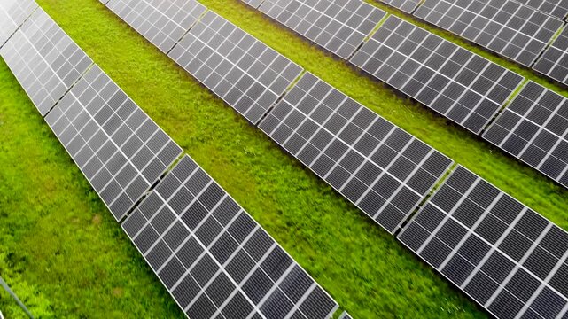 Aerial view of solar farm with photovoltaic panels and green energy production