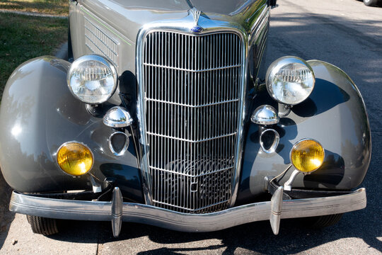 Front view of vintage 1935 Ford Model 48 Deluxe Cabriolet automobile parked on the street. Identified by Google. St Paul Minnesota MN USA