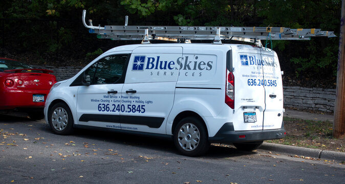 Blue Skies maid and household service truck making a house call. St Paul Minnesota MN USA