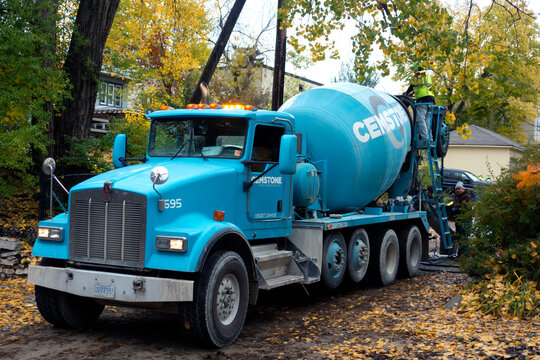 Large blue Chemstone truck delivering cement for a new garage floor. St Paul Minnesota MN USA