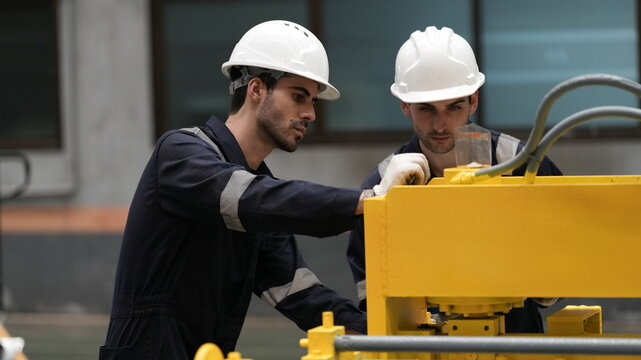 engineer team full skill quality for maintenance and training in industry factory worker , warehouse Workshop for factory operators, mechanical engineering team production.