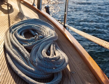close up of thick nautical ropes on a boat deck