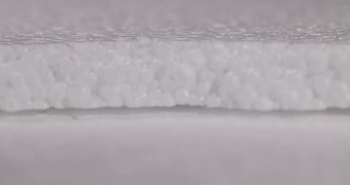 soft white foam for storage, foam sheet made of small soft balls for storing objects and transporting them, close up