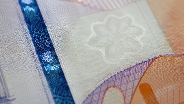 Extreme Close-up of Banknote Security Hologram and Texture