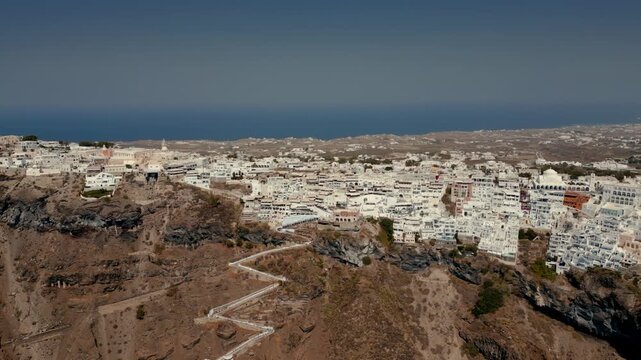 Aerial cliffside view of Fira/Thira, Santorini, Greece with switchback path