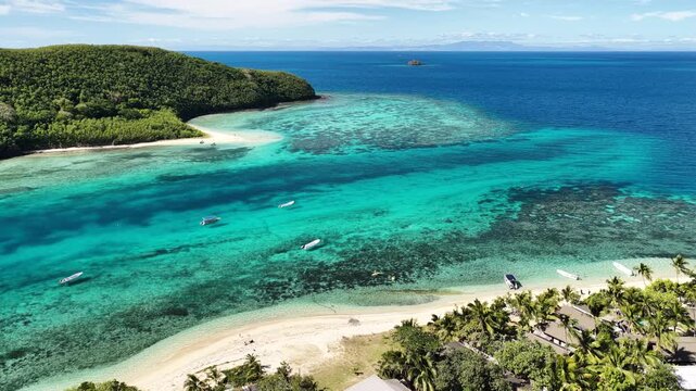 Drone view of a turquoise lagoon Manta Ray Island, Drawaqa Island, Fiji