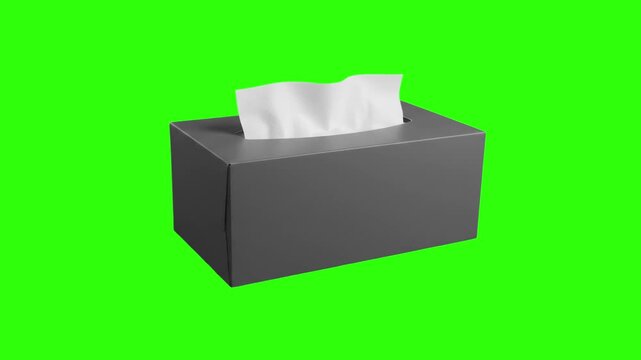 A rectangular dark tissue box container with a white paper tissue sticking out rotates in a 3D loop against a vibrant green screen background. Perfect for health and hygiene campaigns, cold and flu co