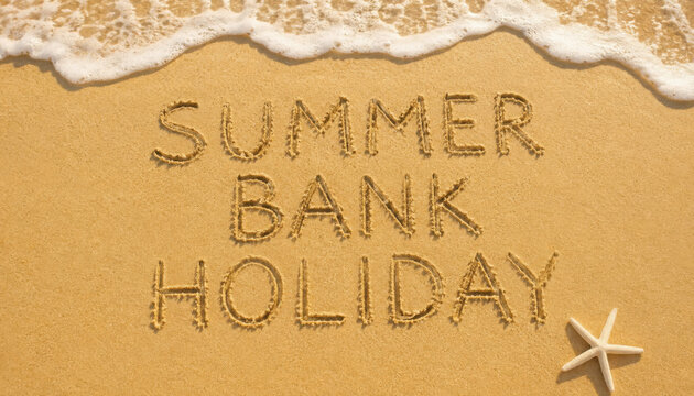 summer bank holiday text in the sand