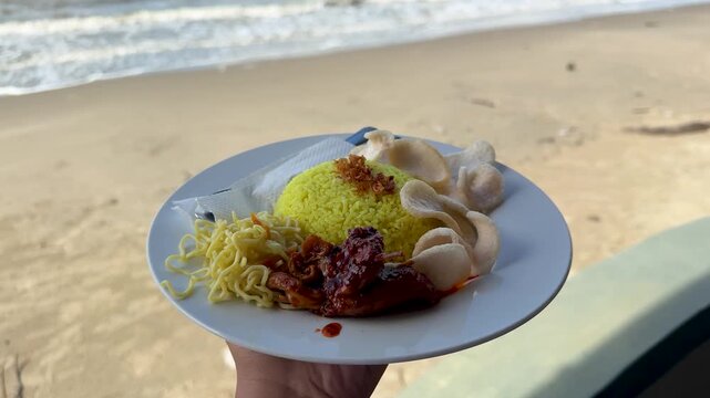 Yellow rice with habang spices at a beachside restaurant