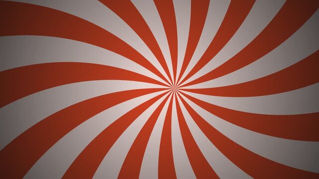 Orange and white swirl pattern rotating in a hypnotic circular motion