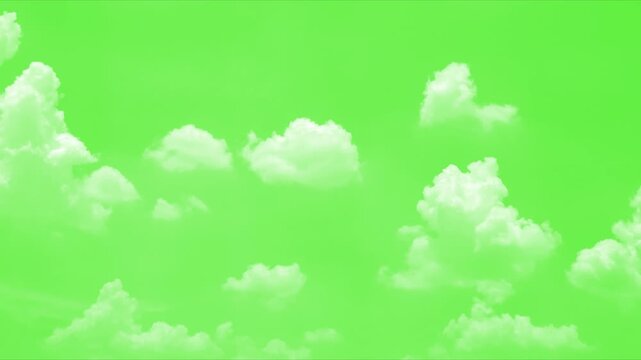 Moving clouds on green screen motion graphic video. white cumulus clouds zoom shoot, cloud moving on green screen, flying clouds green screen. Bottom view of dramatic white clouds moving across.