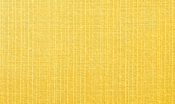 Close up yellow woven fabric texture background with detailed textile linen canvas pattern for commercial mockup product design