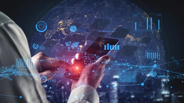 A person interacts with a smartphone displaying various data visualization elements against a backdrop of a global landscape, reflecting modern technology and connectivity. Xenic