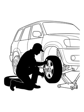 silhouette of a person changing a flat tire on an suv car