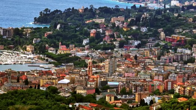 Aerial telezoom of Rapallo city and vibrant coastal homes in Liguria, Italy
