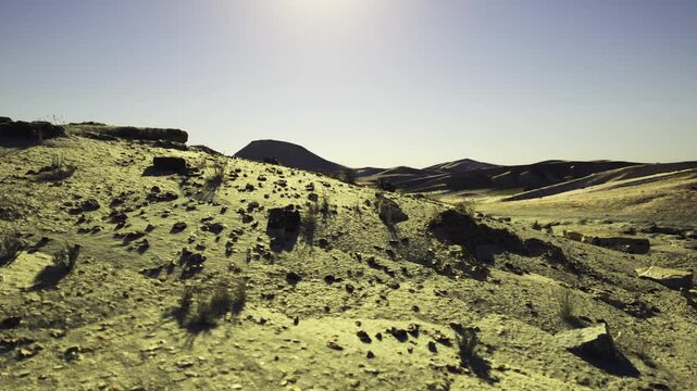 Sunshine valley shows path. Lightfilled gorge points toward faraway hills. Sundrenched valley leads way to remote hilltop expedition route scouting