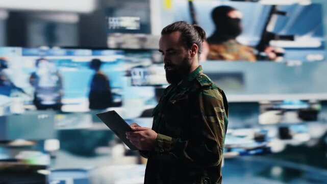 Army officer monitors satellite data and digital threat detection tools in a virtual war zone, supporting national safety, mission control and modern military strategy.