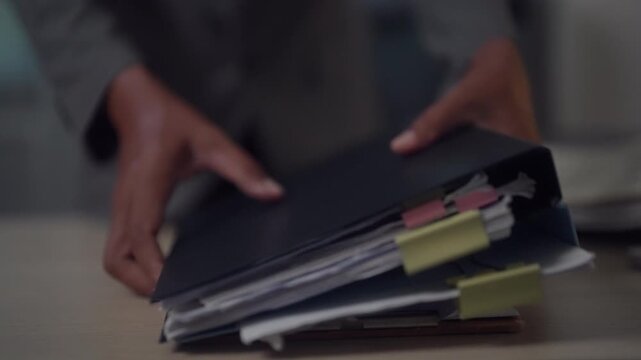 Legal Document Search and Case File Review in Law Office with Organized Paperwork