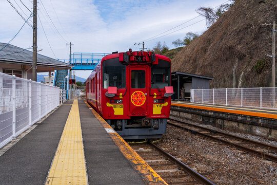 Nagasaki, Japan - March 15 2026: JR Kyushu's red multi-functional track inspection train 'BIG EYE' parked at Okusa Station on the Nagasaki Main Line, Japan.