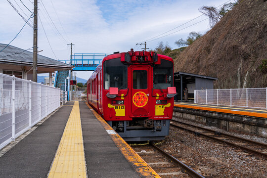 Nagasaki, Japan - March 15 2026: JR Kyushu's red multi-functional track inspection train 'BIG EYE' parked at Okusa Station on the Nagasaki Main Line, Japan.