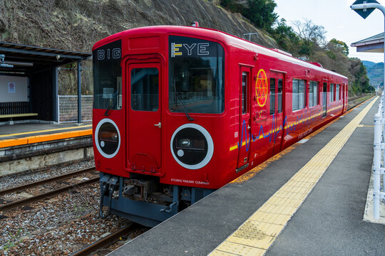 Nagasaki, Japan - March 15 2026: JR Kyushu's red multi-functional track inspection train 'BIG EYE' parked at Okusa Station on the Nagasaki Main Line, Japan.