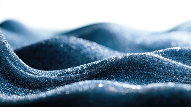Glistening, textured dark blue waves of tiny particles create a mesmerizing, abstract pattern