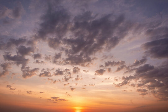 Panoramic view of sunset golden and blue sky nature background.
Colorful dramatic sky with cloud at sunset.Sky background.Sky with clouds at sunset.