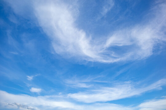 Clear Blue Sky with Soft White Clouds and Bright Natural Daylight Background, Beautiful Clear Blue Sky with Soft White Clouds and Ample Copy Space
Clear blue sky with soft white clouds on a bright sun