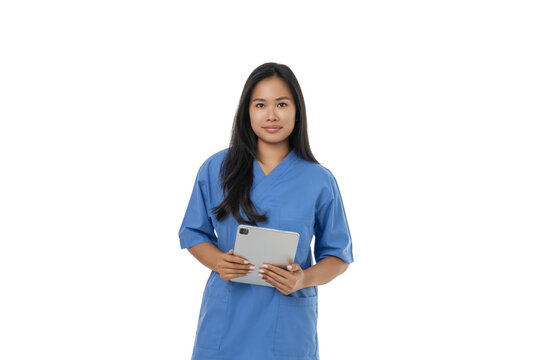 Doctor in blue scrubs holding a tablet, isolated on white, PNG