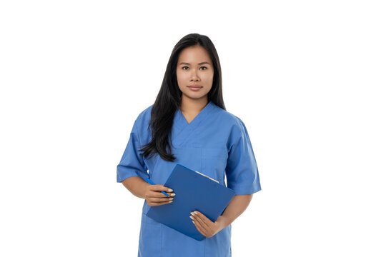 Doctor in blue scrubs with patient file, isolated on white, PNG