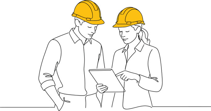 Construction workers discussing plans on tablet at work site