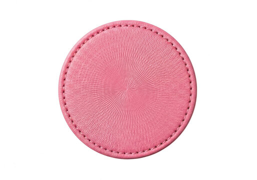 Pink circular fabric patch with stitched border isolated on transparent background